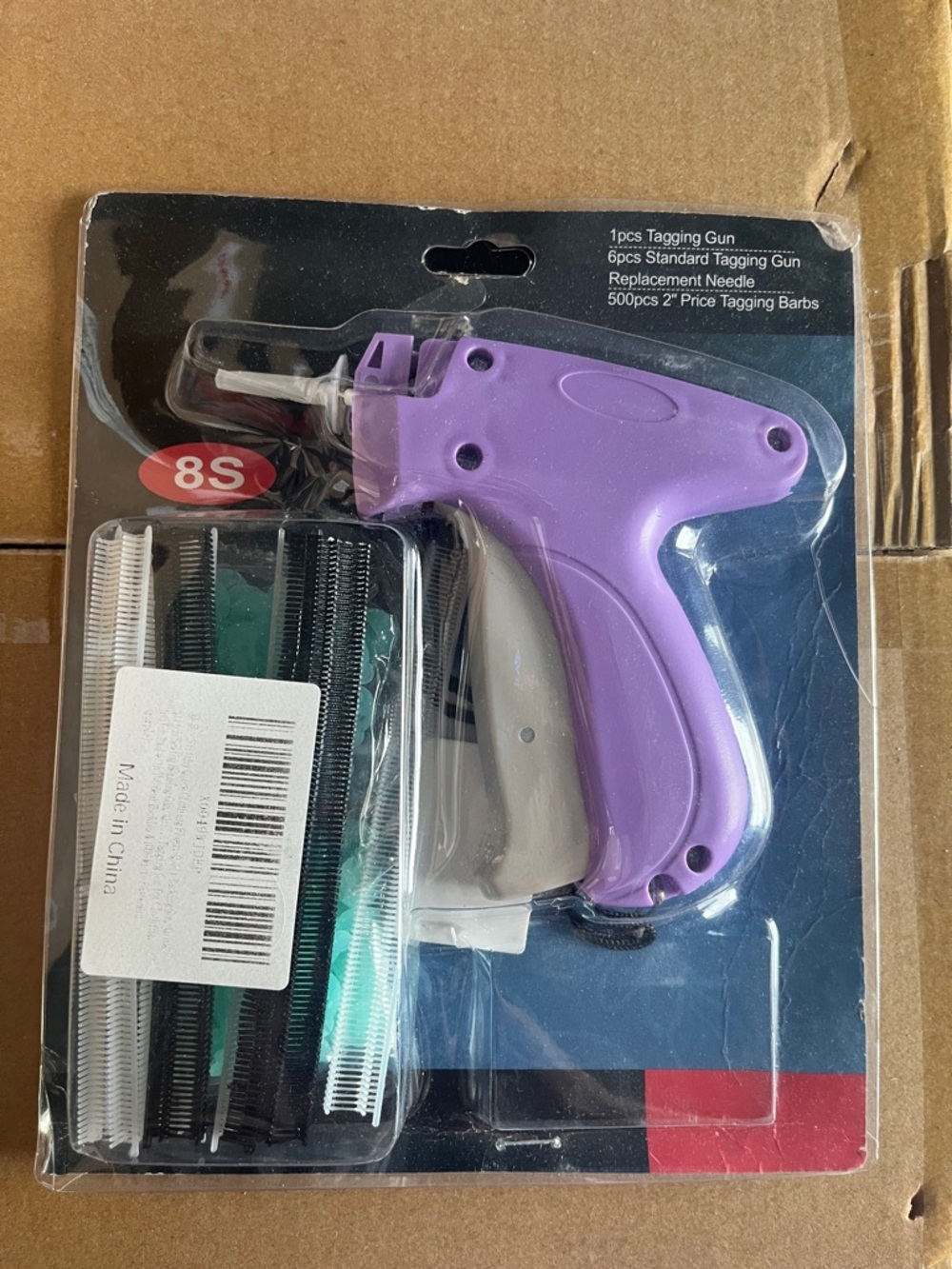 Purple Tagging Gun with Multi-Color Fasteners